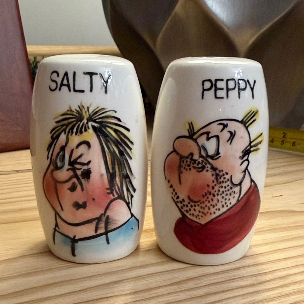 vintage ceramic salt and pepper shakers with cartoon character design